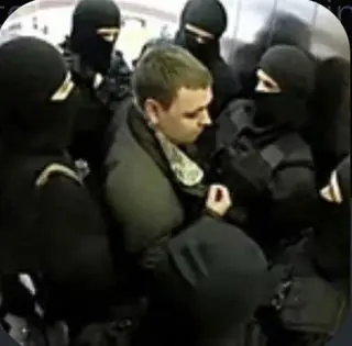 masked Men in an elevator 